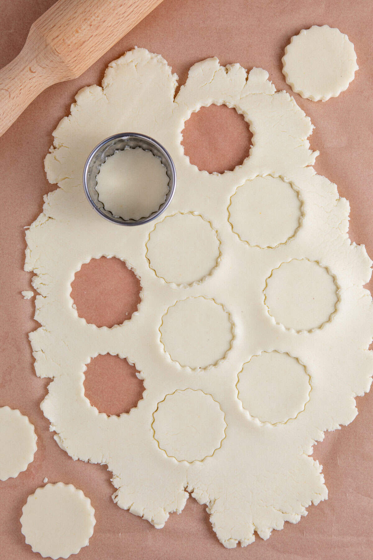 Roll our the dough and use a round cutter to cut out the crackers.