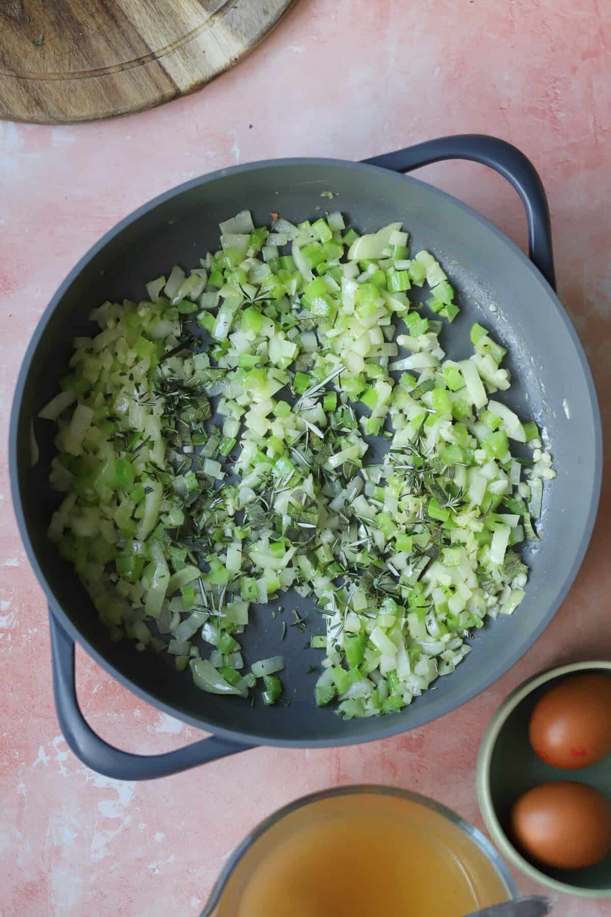 Fry the onion, celery and garlic in butter.