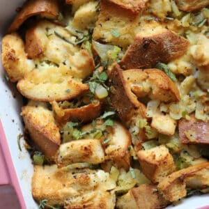A baking tray filled with gluten free Thanksgiving stuffing.