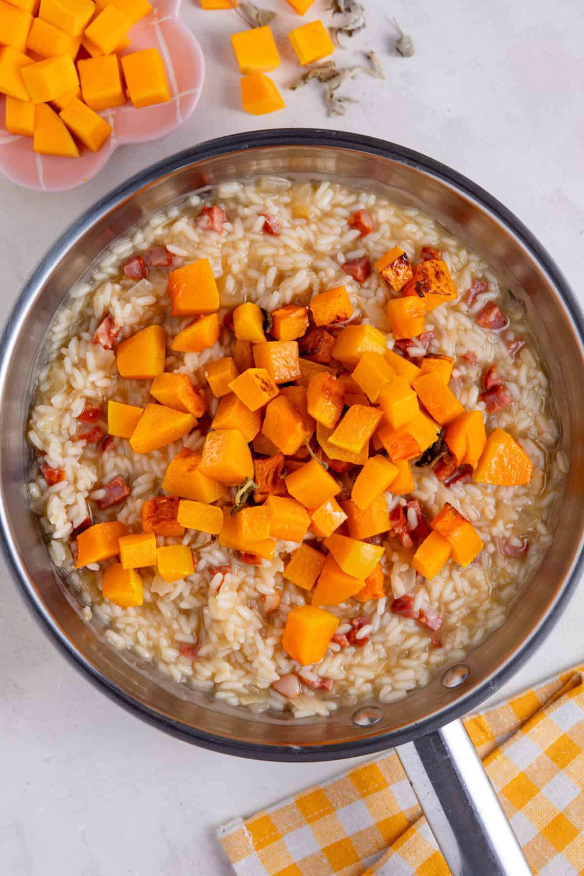 Add the roasted butternut squash and sage to the pan.