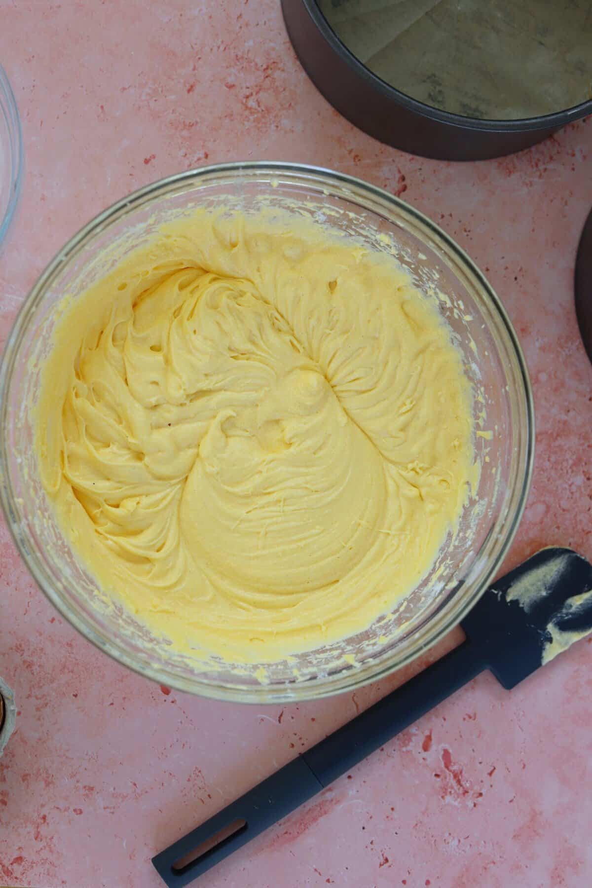 Add the eggs to the gluten free cake mixture and whisk.