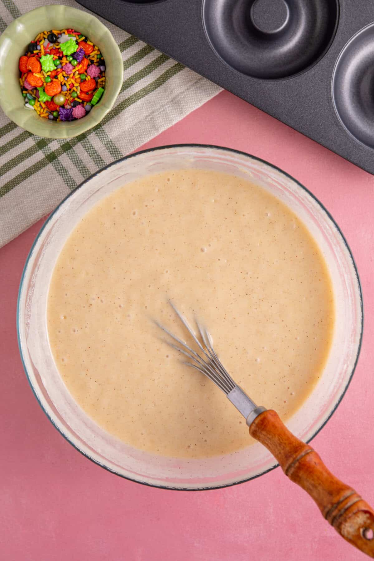 Mix the ingredients together to form a batter for the doughnuts.