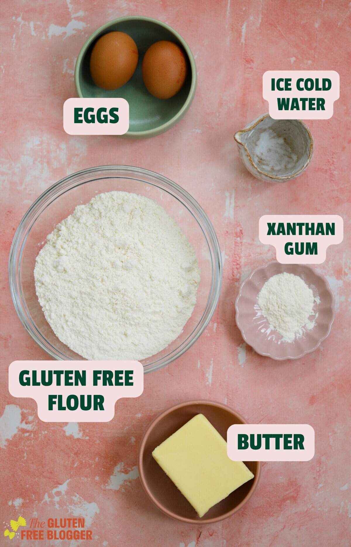 Ingredients for gluten free shortcrust pastry, including flour, butter, eggs and xanthan gum.