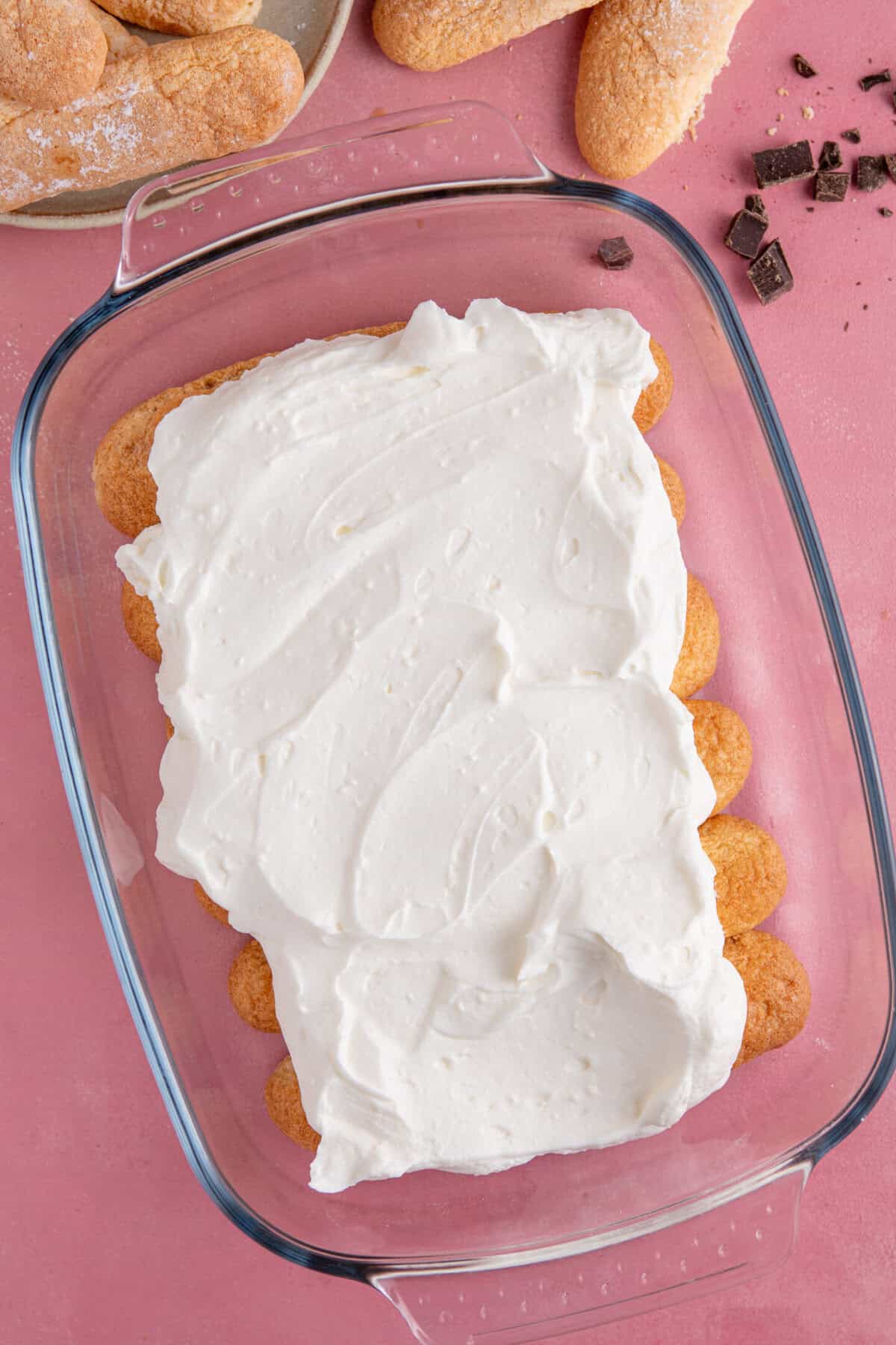 Start with a layer of soaked lady fingers, then the cream on top.