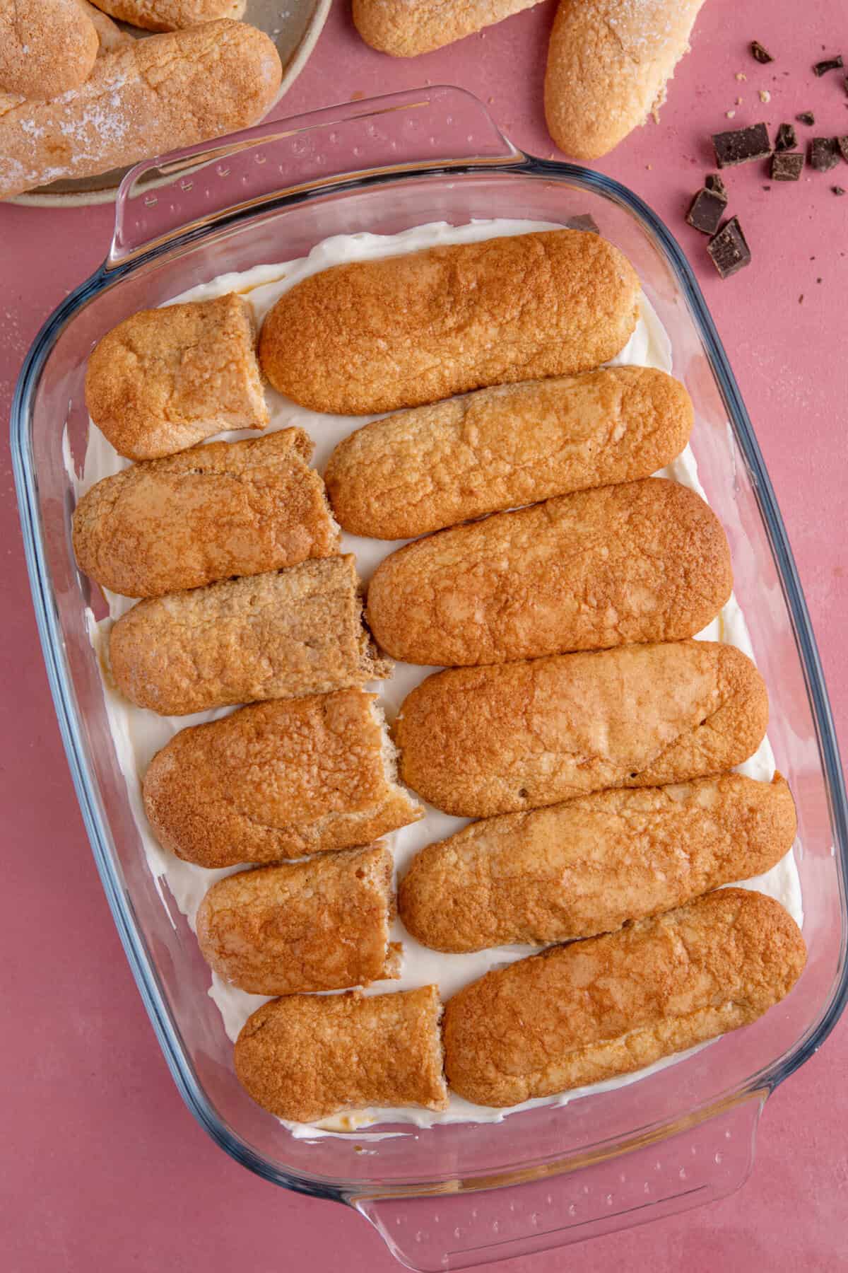 Continue to keep layering up the sponge fingers and cream layers.