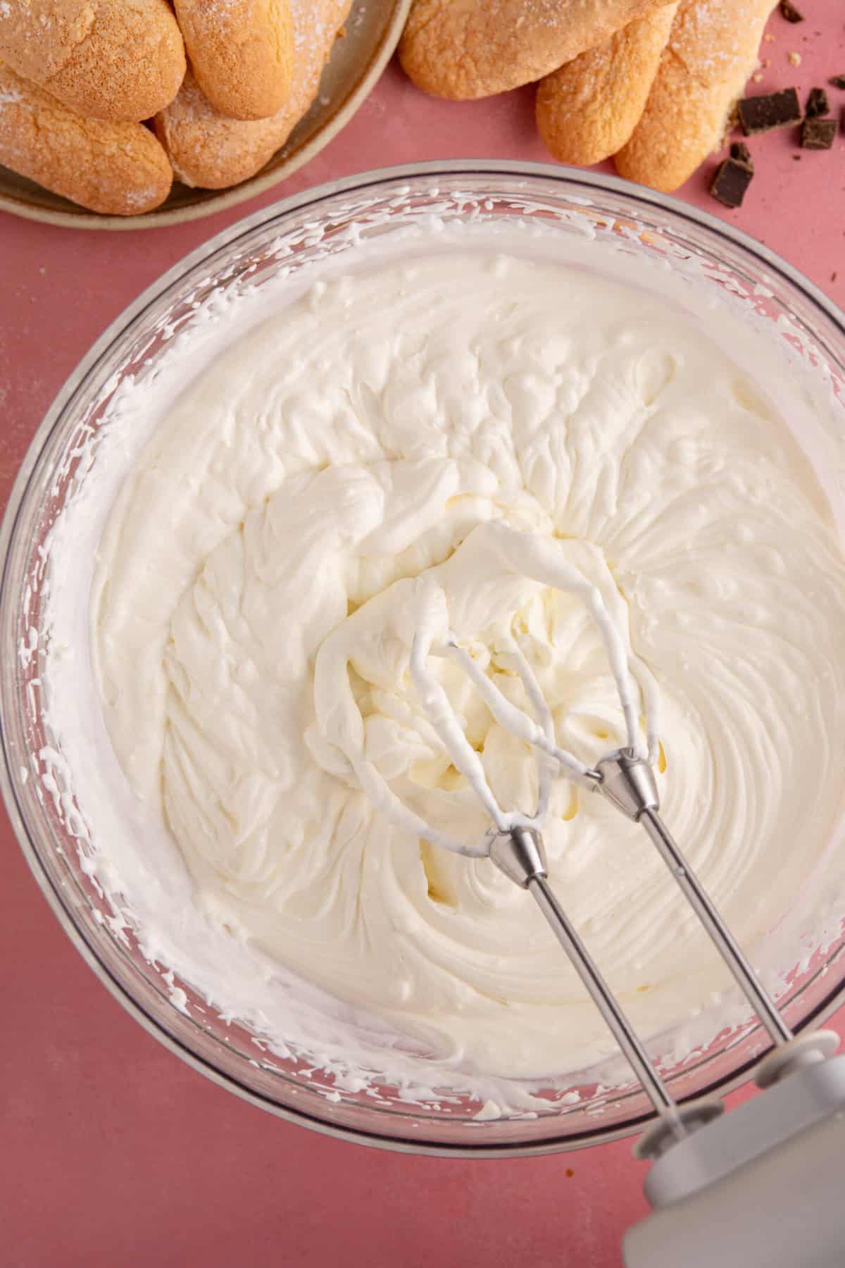 Whip up the cream layer until it's thickened.