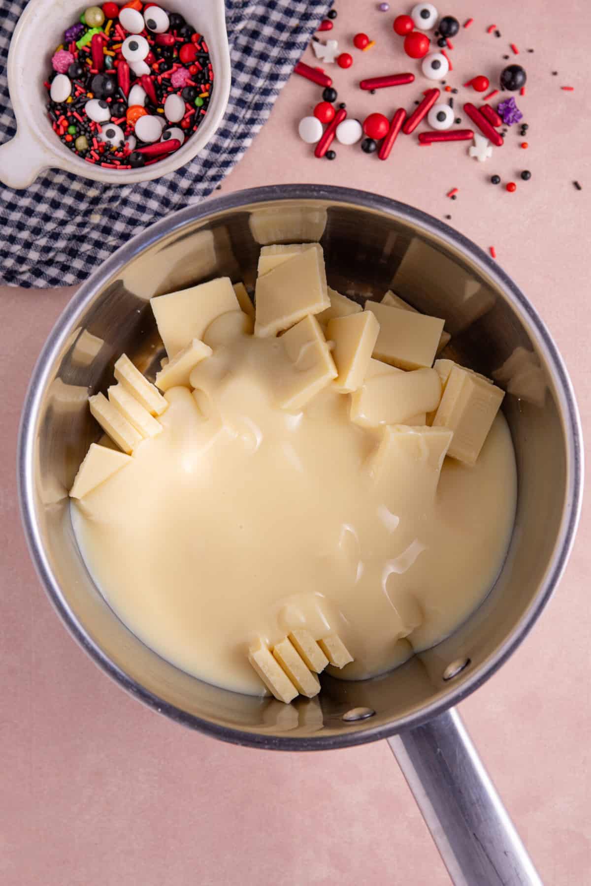 Melt the white chocolate in a saucepan.