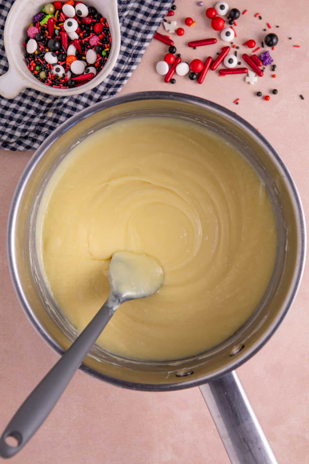 Melt the white chocolate in a saucepan.