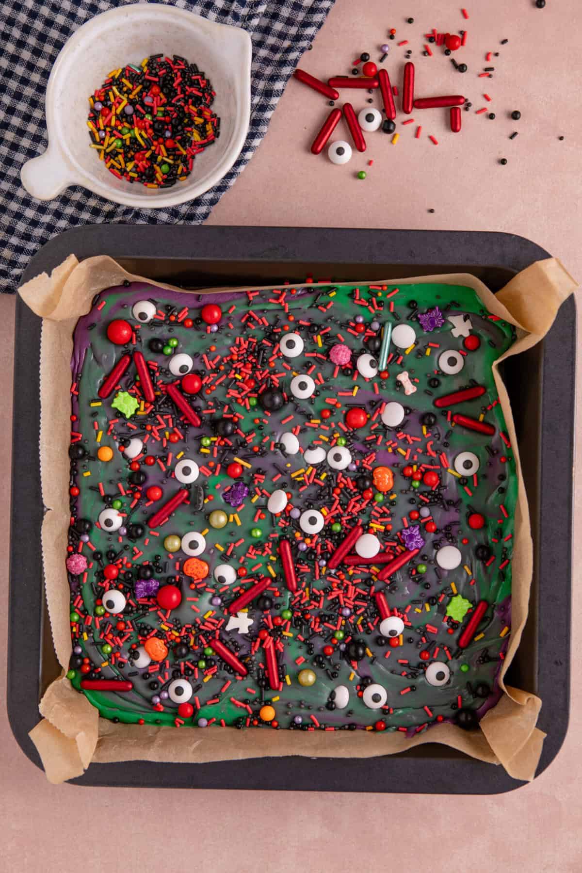 Decorate with Halloween sprinkles and then chill to set before cutting up.