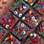 Squares of purple and green Halloween fudge,