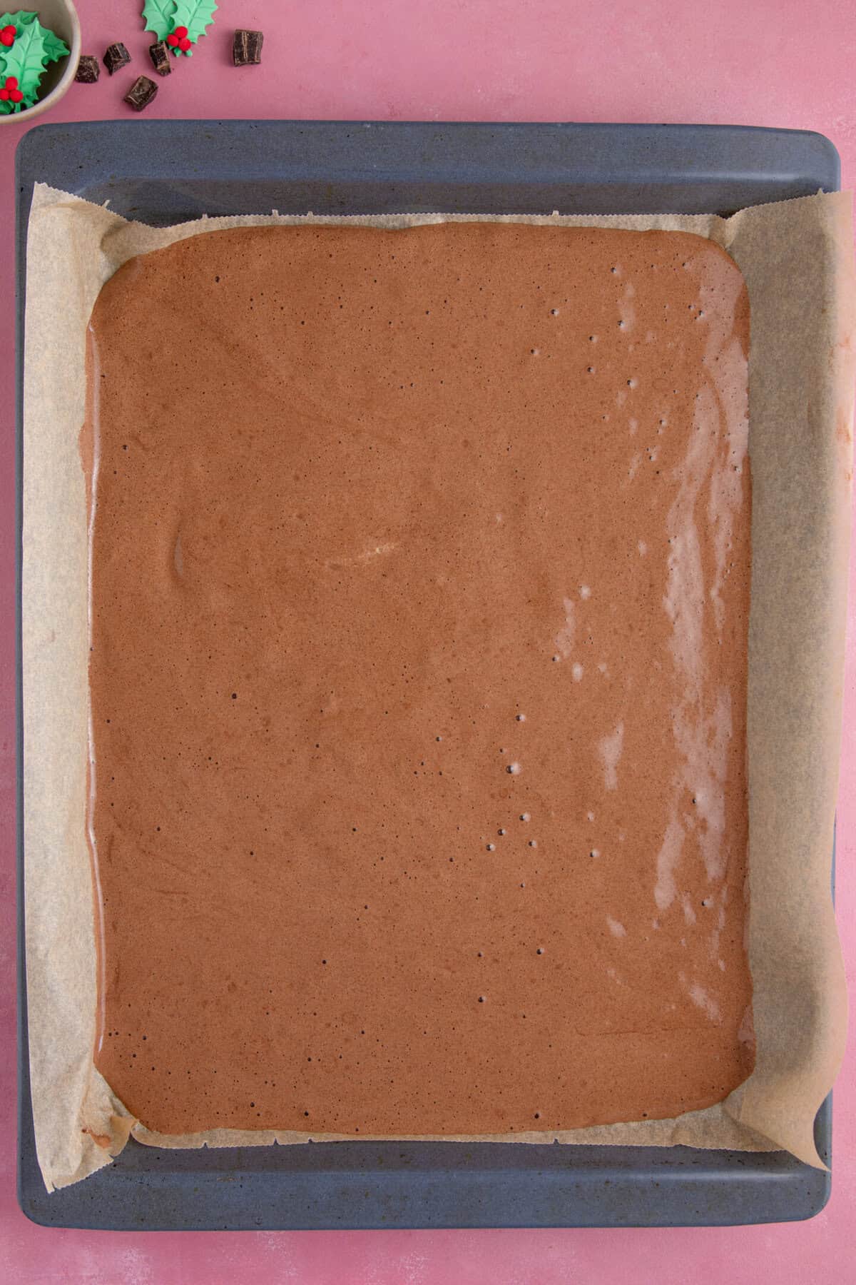 Combine the egg whites and yolk mixtures then spread into a large swiss roll tin.