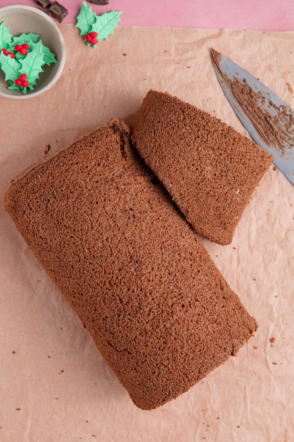 Cut off the end of the yule log at an angle to create a branch, like this.