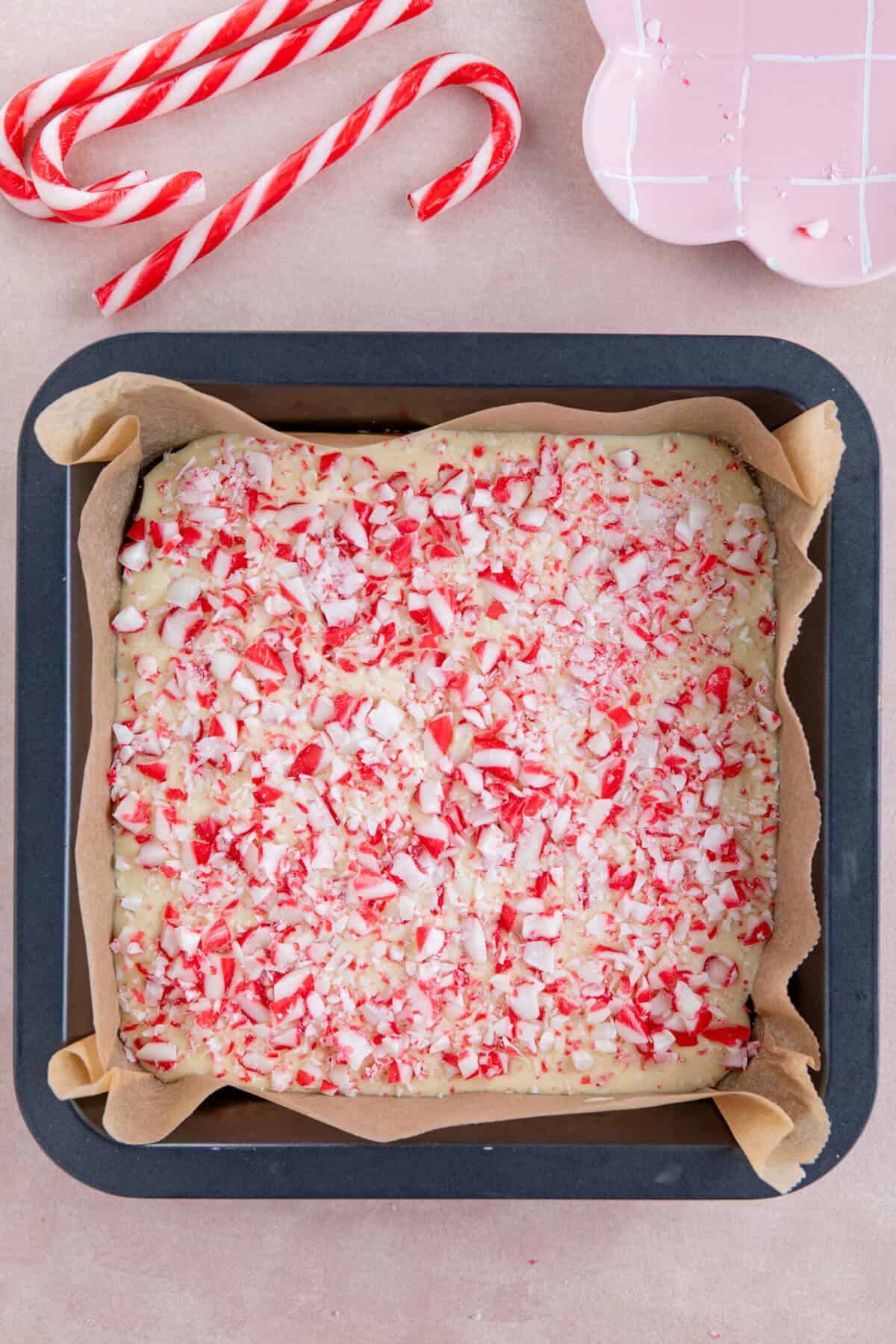 Top the peppermint bark with crushed candy canes and then chill until set.