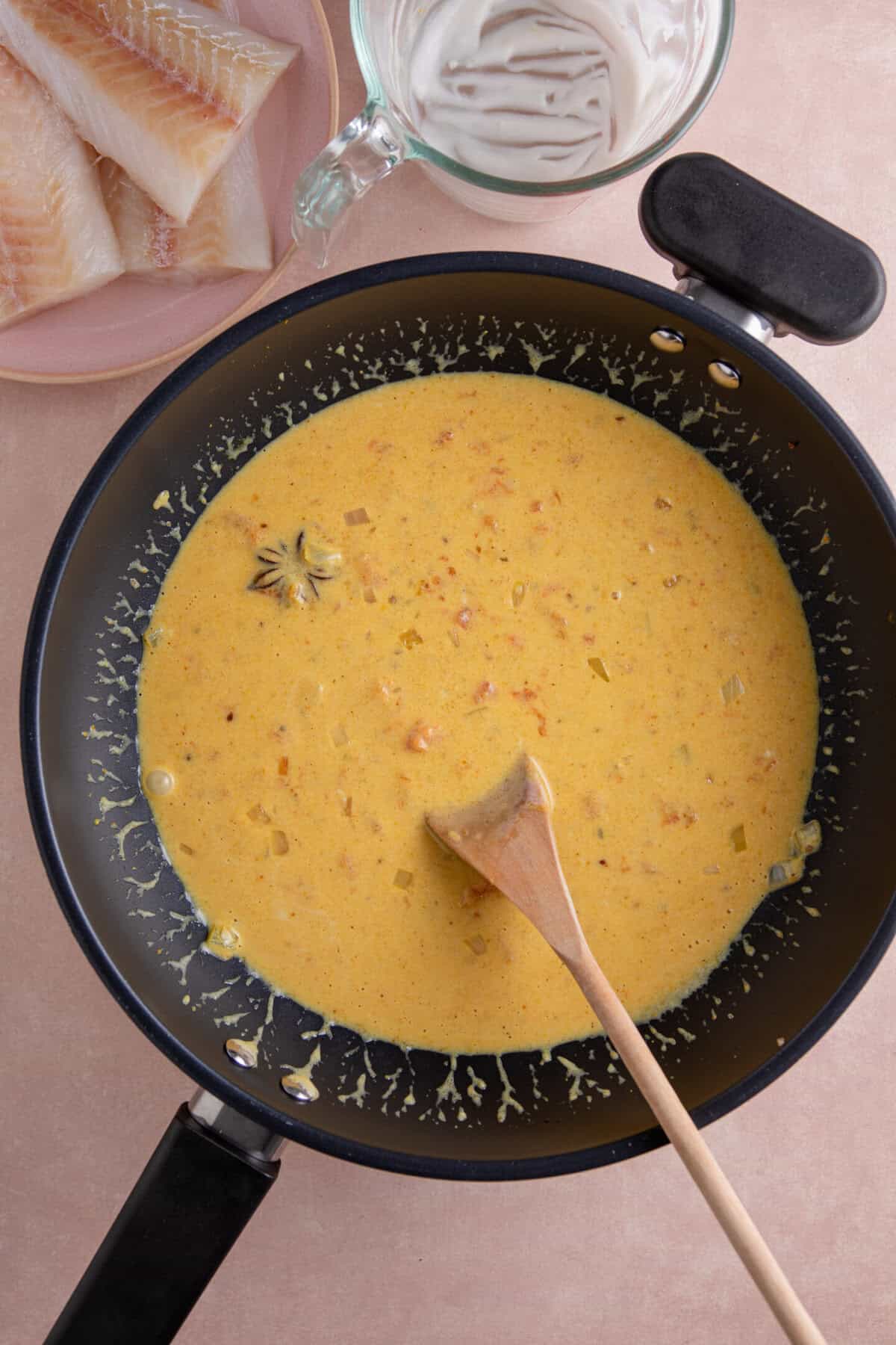 Add the coconut milk to the pan.
