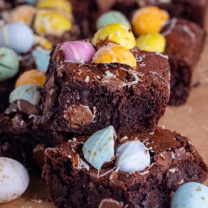 A stack of gluten free Mini Egg brownies.