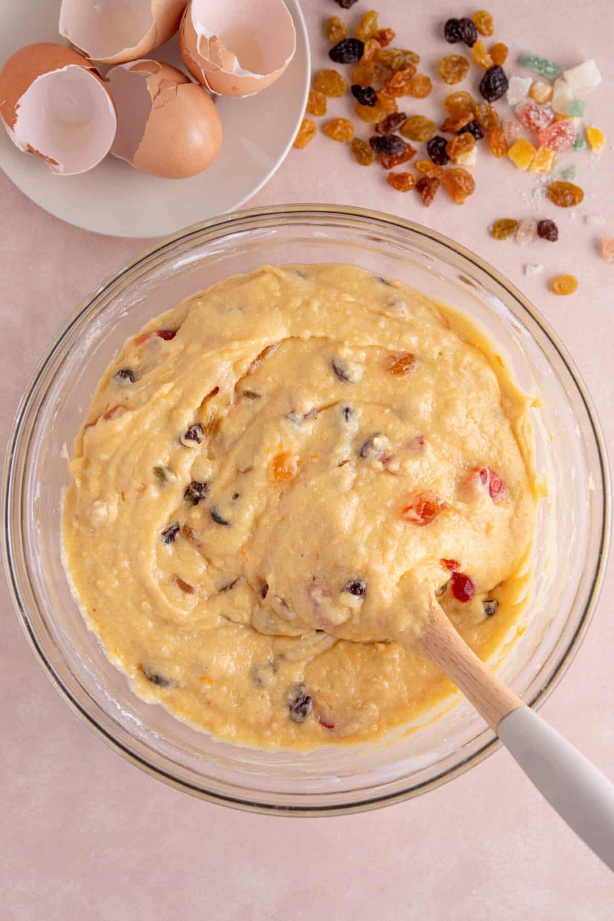 Process shot of a gluten free fruit cake recipe showing the cake batter in the bowl.