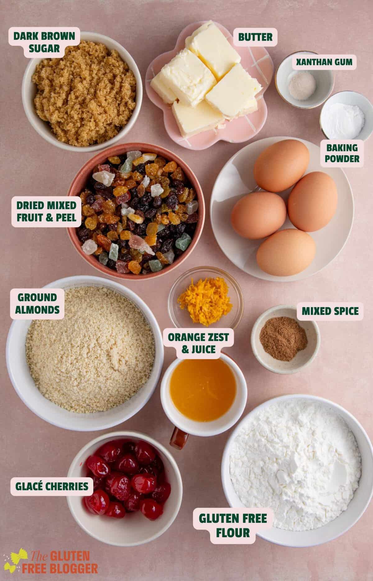 Ingredients for gluten free fruit cake with text labels.