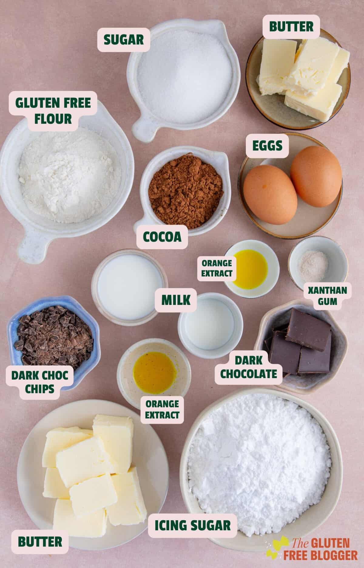 Ingredients for gluten free chocolate orange cupcakes with text labels.