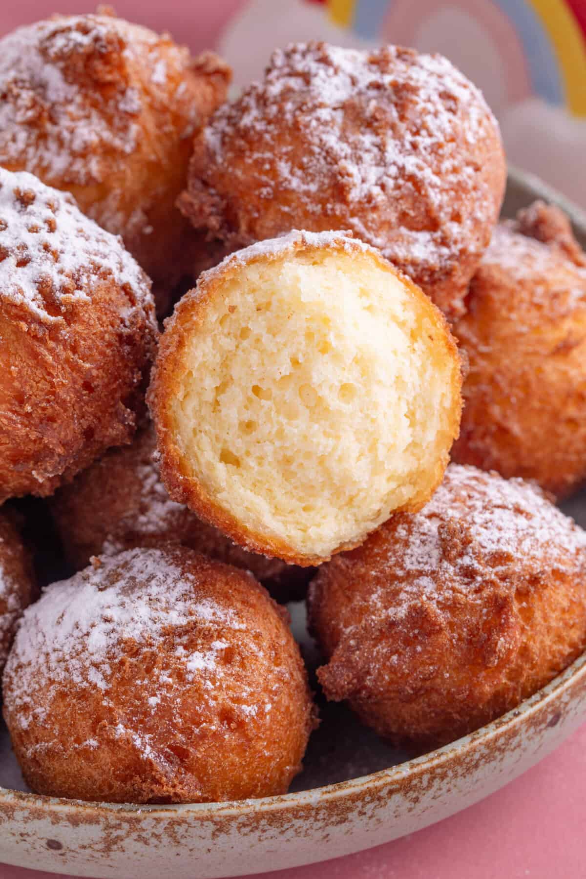 A cross section of a gluten free zeppole showing the texture inside.