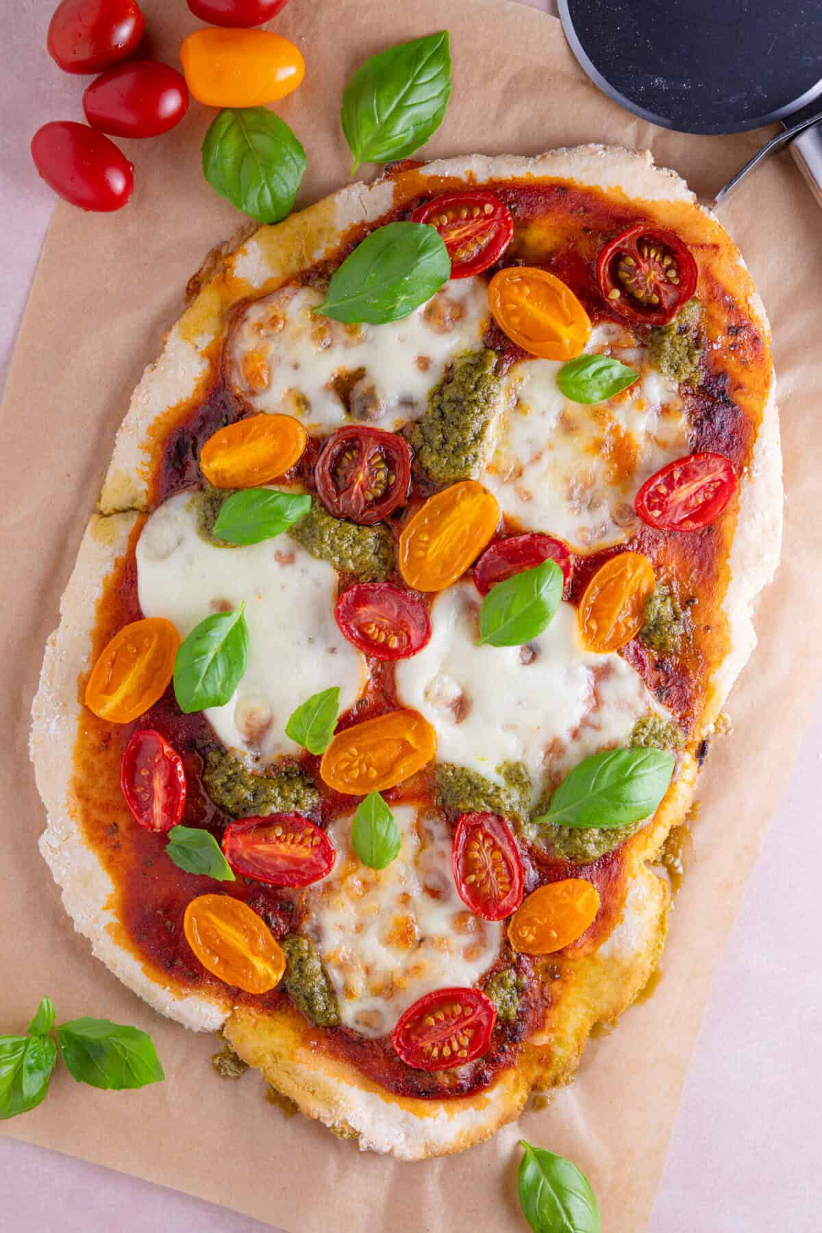 Process shot of gluten free flatbread pizza recipe showing the finished pizza.