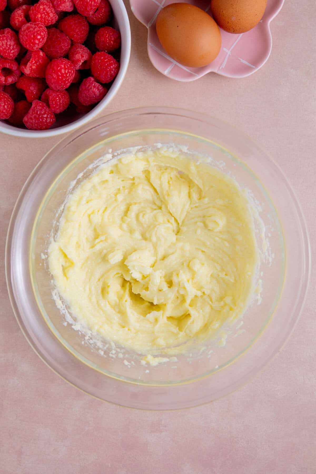 Cream together the butter, sugar and olive oil.