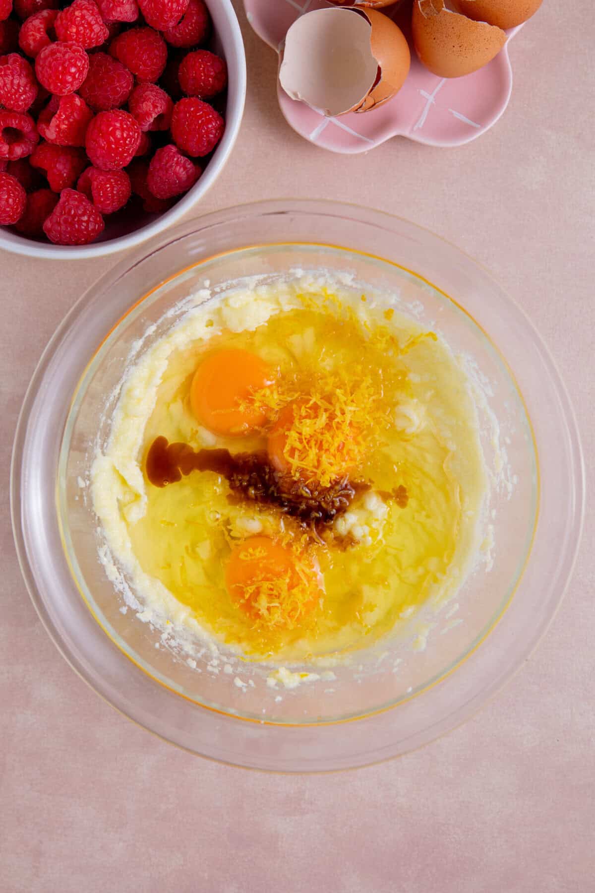 Add the eggs, lemon and vanilla to the cake batter.