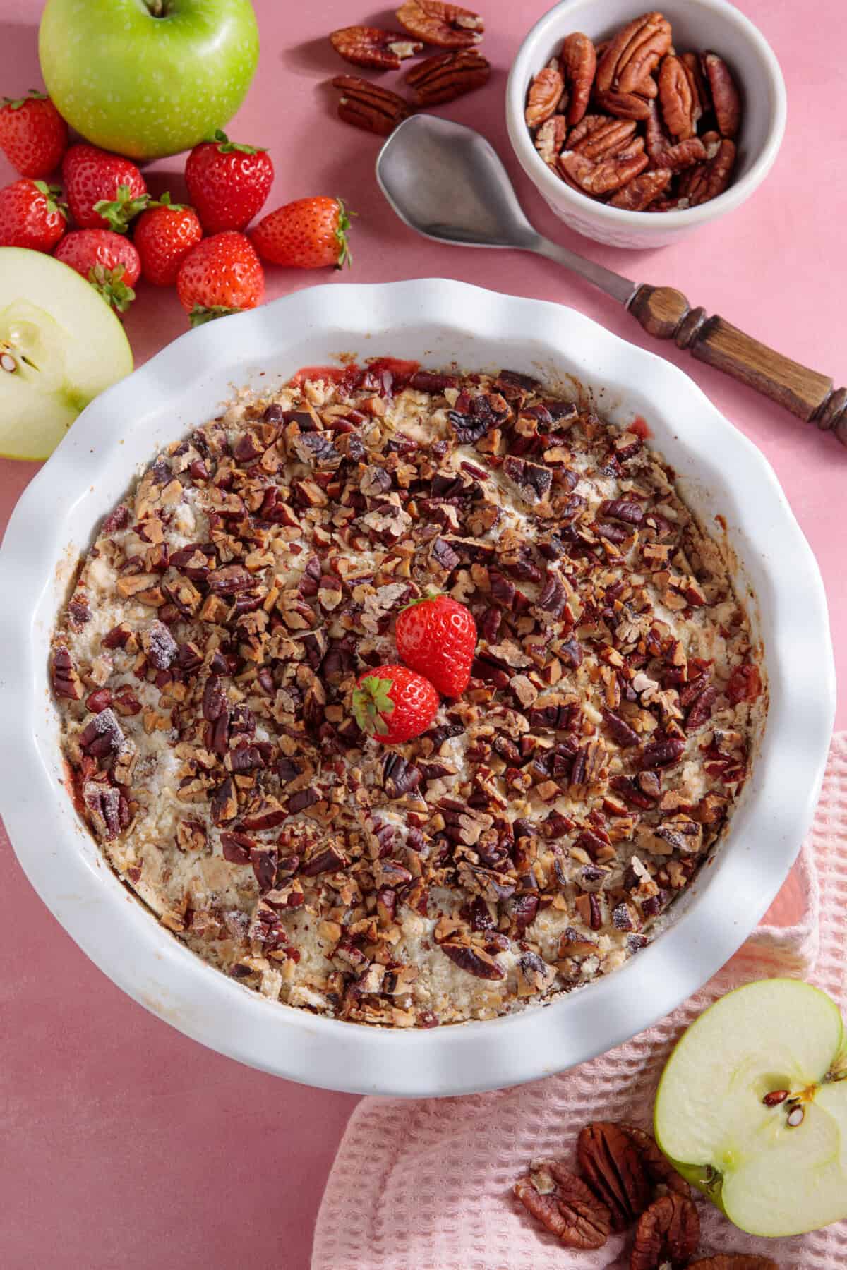 Process shot for apple and strawberry crumble recipe showing the finished crumble.