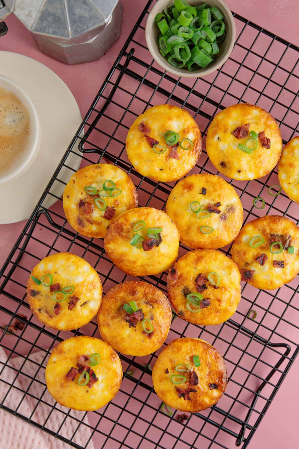 Process shot of cottage cheese egg bites recipe showing the egg bites on a cooling rack.