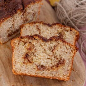 Slices of cinnamon swirl banana bread on a board,
