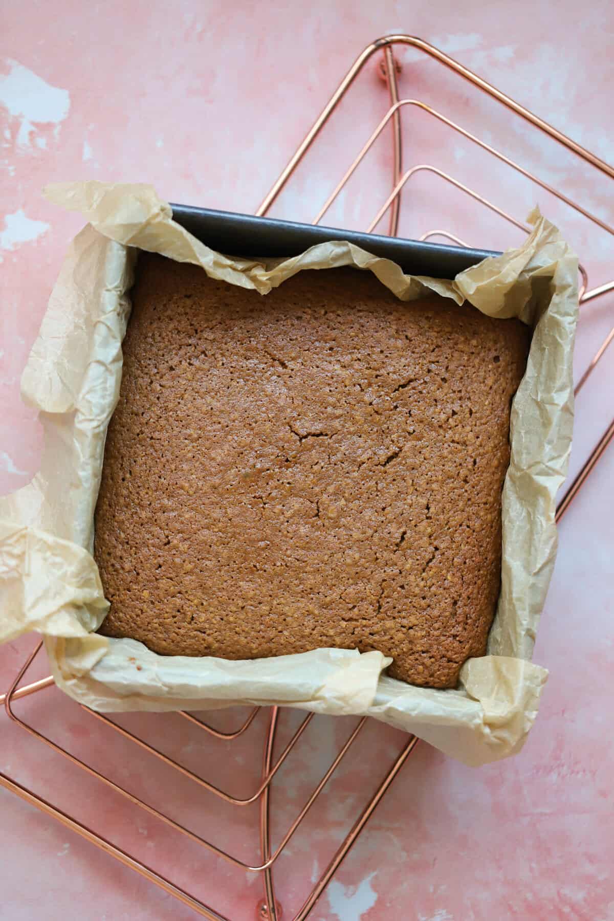 Process shot for gluten free parkin recipe showing the parkin in a tin.