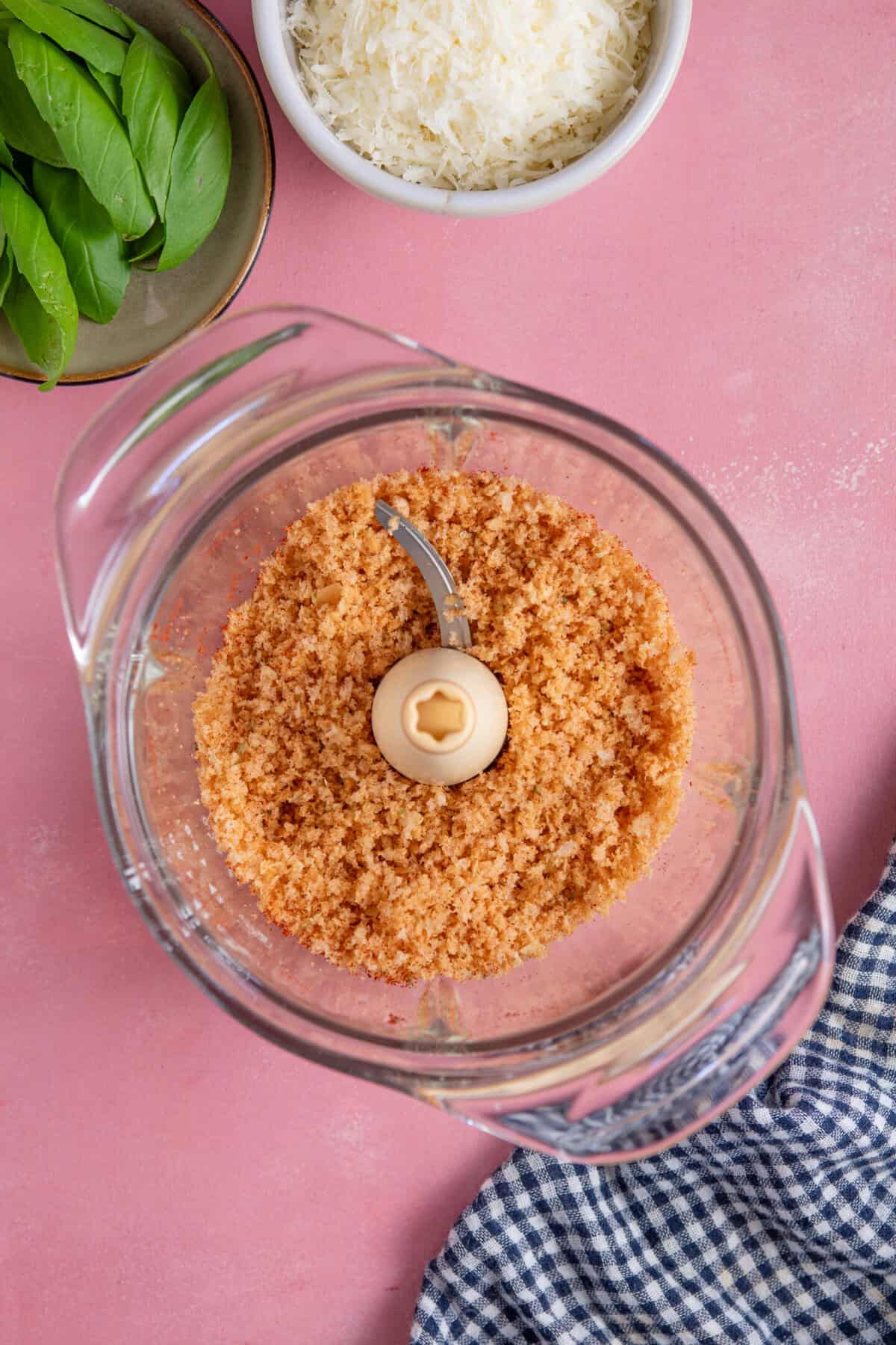 Process shot for Marry Me Chicken Meatballs showing breadcrumbs in a food processor.