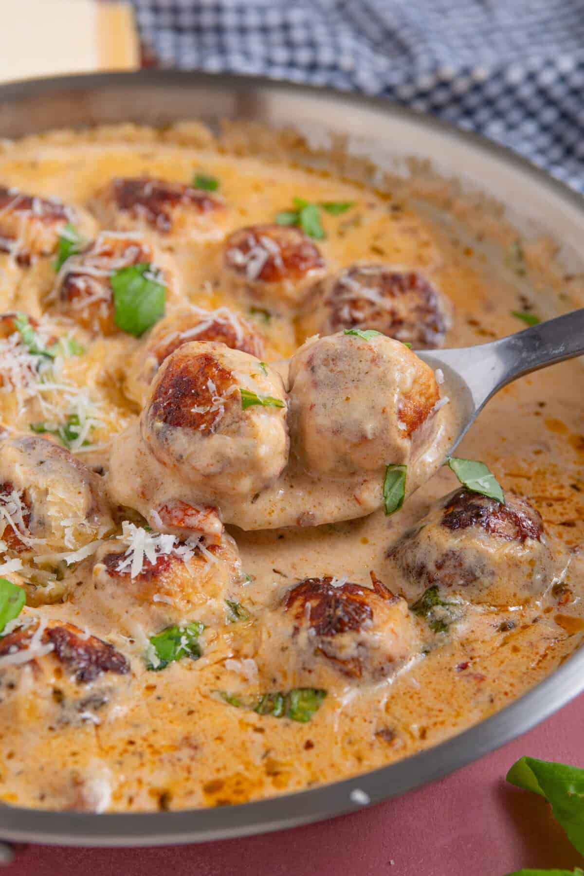 A pan of marry me meatballs - chicken meatballs in a creamy sauce.