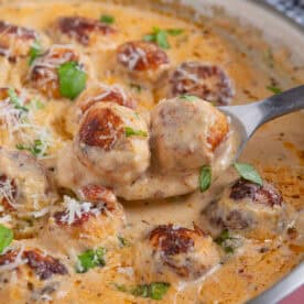 A pan of marry me meatballs - chicken meatballs in a creamy sauce.