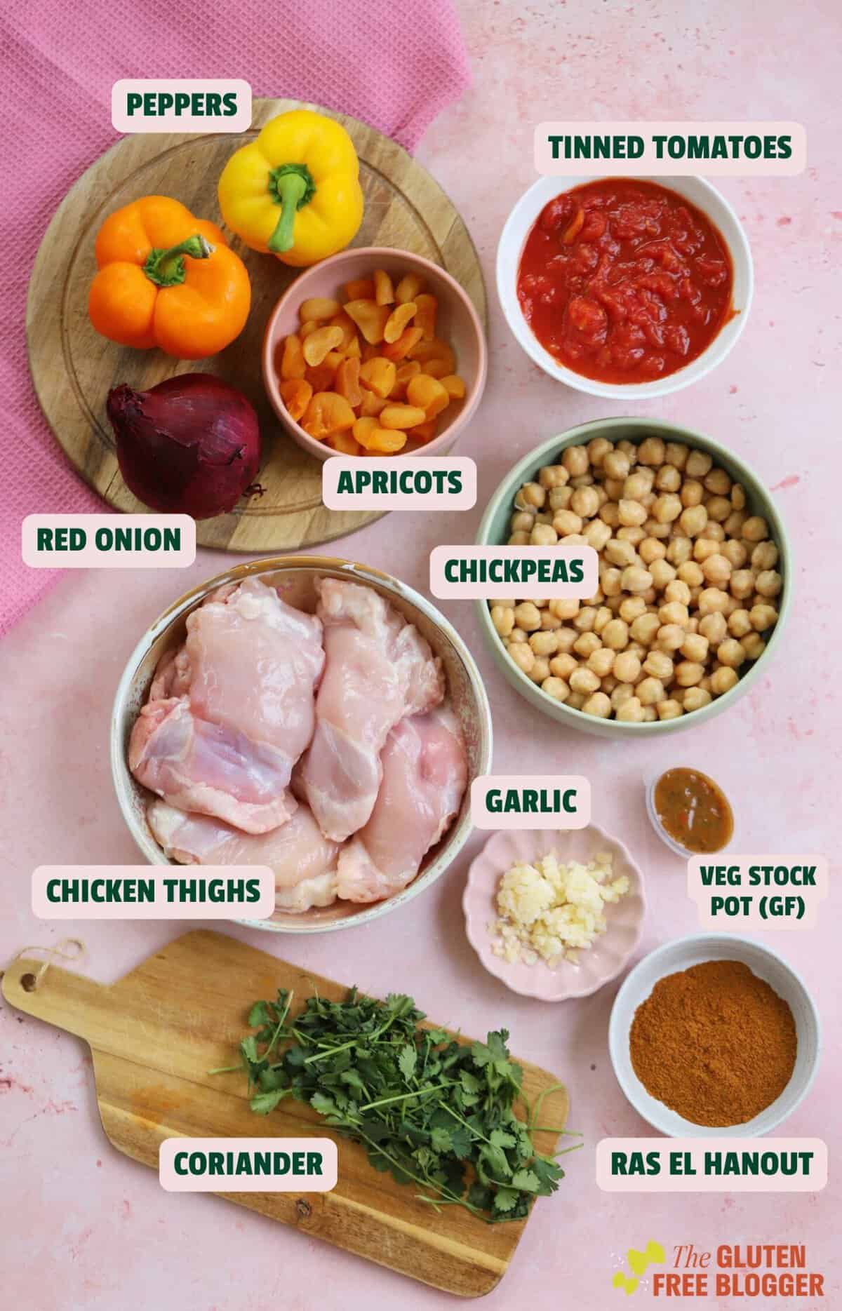 Ingredients for slow cooker chicken tagine with text labels.