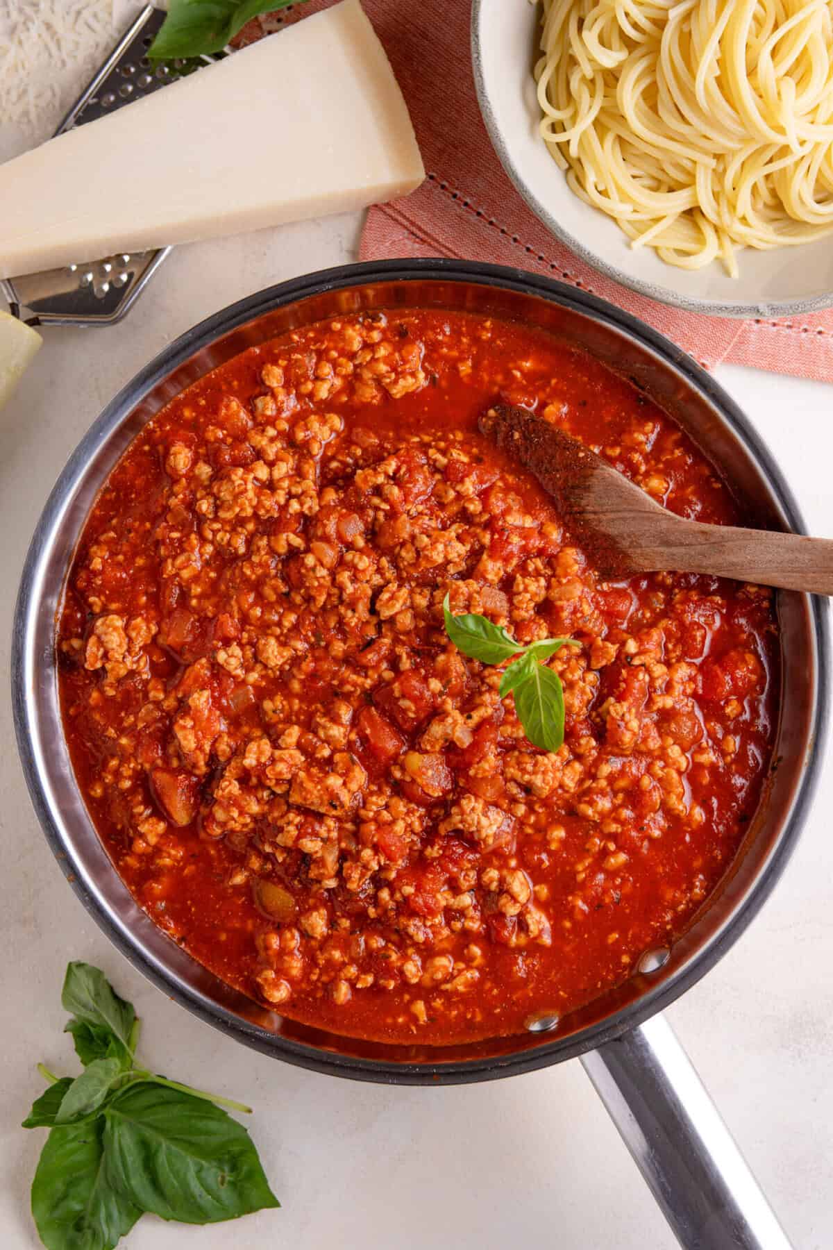 Process shot for turkey bolgonese recipe showing the finished bolognese in a pan.